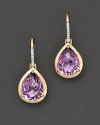 A beautiful faceted teardrop amethyst drop earrings in 14 Kt. yellow gold with diamond accents.