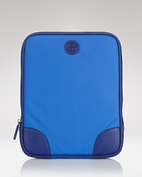 Get down to business with this nylon tablet case from Tory Burch, sure to be your prettiest new partner. Get down to business with this nylon tablet case from Tory Burch, sure to be your prettiest new partner.