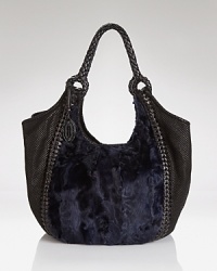Elegant allure in carryall proportions. This Elie Tahari hobo gets it day-right in rich leather with polished details. Elegant allure in carryall proportions. This Elie Tahari hobo gets it day-right in rich leather with polished details.