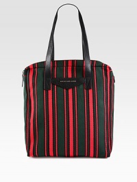 A versatile shopper tote for the man on-the-go, rendered in a sharply striped cotton blend with pebbled leather handles.Zip closureDouble top handles, 26 dropInterior zip pocket70% cotton/20% polyester/10% leather14W x 17H x 3DImported A versatile shopper tote for the man on-the-go, rendered in a sharply striped cotton blend with pebbled leather handles.Zip closureDouble top handles, 26 dropInterior zip pocket70% cotton/20% polyester/10% leather14W x 17H x 3DImported