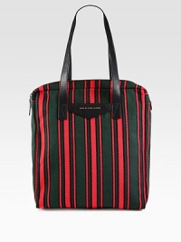 A versatile shopper tote for the man on-the-go, rendered in a sharply striped cotton blend with pebbled leather handles.Zip closureDouble top handles, 26 dropInterior zip pocket70% cotton/20% polyester/10% leather14W x 17H x 3DImported