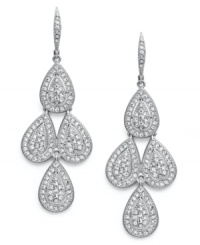 Let the elegance rain down. These beautiful drop earrings from Eliot Danori flaunt cascading, raindrop-shaped pendants. Crafted in rhodium-plated silver tone mixed metal with sparkling glass crystals. Approximate drop: 2 inches. Let the elegance rain down. These beautiful drop earrings from Eliot Danori flaunt cascading, raindrop-shaped pendants. Crafted in rhodium-plated silver tone mixed metal with sparkling glass crystals. Approximate drop: 2 inches.