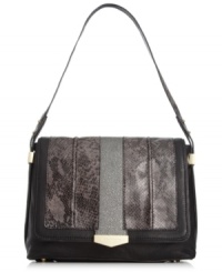 Join the reptilian rave with this snakeskin print design from juicy Couture. Butter-soft leather and luxe golden accents take this tried-and-true bag beyond urban-jungle cool. Join the reptilian rave with this snakeskin print design from juicy Couture. Butter-soft leather and luxe golden accents take this tried-and-true bag beyond urban-jungle cool.