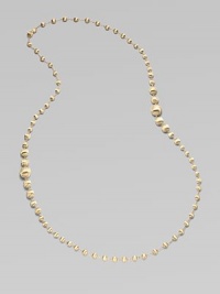 An elegant strand of brushed 18k yellow gold beads.18k yellow gold Length, about 36 Lobster clasp Made in Italy An elegant strand of brushed 18k yellow gold beads.18k yellow gold Length, about 36 Lobster clasp Made in Italy
