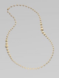 An elegant strand of brushed 18k yellow gold beads.18k yellow gold Length, about 36 Lobster clasp Made in Italy