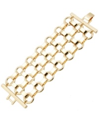 Take the guesswork out of your wardrobe. With its intricate mesh pattern, GUESS's multi-dimensional link bracelet is a no-brainer. Crafted in shiny gold tone mixed metal. Approximate length: 7-1/2 inches. Take the guesswork out of your wardrobe. With its intricate mesh pattern, GUESS's multi-dimensional link bracelet is a no-brainer. Crafted in shiny gold tone mixed metal. Approximate length: 7-1/2 inches.