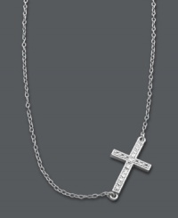A modern update on the traditional cross. Studio Silver adds a simple twist by turning a symbolic cross pendant on its side. Crafted in sterling silver with a light reflecting diamond-cut surface and rhodium plating to prevent tarnishing. Approximate length: 16 inches + 2-inch extender. Approximate drop: 1/2 inch. A modern update on the traditional cross. Studio Silver adds a simple twist by turning a symbolic cross pendant on its side. Crafted in sterling silver with a light reflecting diamond-cut surface and rhodium plating to prevent tarnishing. Approximate length: 16 inches + 2-inch extender. Approximate drop: 1/2 inch.
