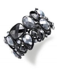 Smoky style. With an array of alluring plastic stones in silver and gray hues, this Style&co. bracelet adds intrigue to your look. Crafted in hematite tone mixed metal. Approximate diameter: 3 inches. Smoky style. With an array of alluring plastic stones in silver and gray hues, this Style&co. bracelet adds intrigue to your look. Crafted in hematite tone mixed metal. Approximate diameter: 3 inches.