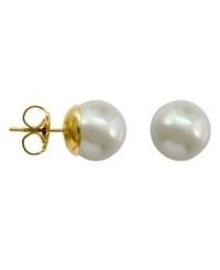 From the island of Mallorca, Spain, these stud earrings feature always-classic white round organic man-made pearls (12 mm) with 14k gold posts. From the island of Mallorca, Spain, these stud earrings feature always-classic white round organic man-made pearls (12 mm) with 14k gold posts.