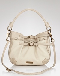 Upgrade your practical purse portfolio with this leather crossbody from Burberry, boasting brass hardware. It perfects on-the-go style, so carry it to add a patterned punch to your daily uniform. Upgrade your practical purse portfolio with this leather crossbody from Burberry, boasting brass hardware. It perfects on-the-go style, so carry it to add a patterned punch to your daily uniform.