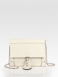 Chic and ladylike leather silhouette, with a delicate chain shoulder strap and scalloped detailing at the bottom corners.Goldtone chain strap, 19 drop Snap flap closure with signature buckle detail Outside open pocket Inside zip pocket Fully lined 9¾W X 8H X 2½D Made in Italy Chic and ladylike leather silhouette, with a delicate chain shoulder strap and scalloped detailing at the bottom corners.Goldtone chain strap, 19 drop Snap flap closure with signature buckle detail Outside open pocket Inside zip pocket Fully lined 9¾W X 8H X 2½D Made in Italy