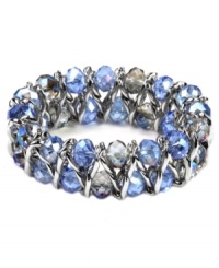 Slip on clusters of captivating colors with AK Anne Klein's stretch bracelet, with vibrant blue color glass beads. Crafted in imitation rhodium-plated mixed metal. Approximate diameter: 2-1/4 inches. Slip on clusters of captivating colors with AK Anne Klein's stretch bracelet, with vibrant blue color glass beads. Crafted in imitation rhodium-plated mixed metal. Approximate diameter: 2-1/4 inches.