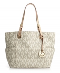 Make a signature statement this season with Michael Kors' chic logo print tote. Make a signature statement this season with Michael Kors' chic logo print tote.