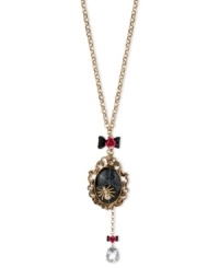 Enter Betsey Johnson's web of influence with this cameo and necklace, featuring a spider motif. Crafted from gold-tone mixed metal, the necklace features bow and flower details, a black oval locket and a teardrop glass crystal accent dangling down. Approximate length: 30 inches + 3-inch extender. Approximate drop (locket): 3-3/4 inches. Approximate drop (frontal chain): 5-1/4 inches. Enter Betsey Johnson's web of influence with this cameo and necklace, featuring a spider motif. Crafted from gold-tone mixed metal, the necklace features bow and flower details, a black oval locket and a teardrop glass crystal accent dangling down. Approximate length: 30 inches + 3-inch extender. Approximate drop (locket): 3-3/4 inches. Approximate drop (frontal chain): 5-1/4 inches.