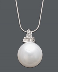 A simple pearl and a touch of sparkle takes your look a long way. Pendant highlights a cultured South Sea pearl (13-14 mm) suspended from a delicate 14k white gold setting and chain. Bail accented with round-cut sparkling diamonds (1/8 ct. t.w.). Approximate length: 18 inches. Approximate drop: 3/4 inch. A simple pearl and a touch of sparkle takes your look a long way. Pendant highlights a cultured South Sea pearl (13-14 mm) suspended from a delicate 14k white gold setting and chain. Bail accented with round-cut sparkling diamonds (1/8 ct. t.w.). Approximate length: 18 inches. Approximate drop: 3/4 inch.