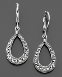 Shining silver style: these fashionable Judith Jack earrings feature sterling silver and genuine marcasite. Approximate drop: 1-1/4 inches. Shining silver style: these fashionable Judith Jack earrings feature sterling silver and genuine marcasite. Approximate drop: 1-1/4 inches.