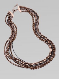 A six row, chunky, textural piece that is mixed in with glittering glass stones. Brass Length, about 30 Lobster clasp closure Imported A six row, chunky, textural piece that is mixed in with glittering glass stones. Brass Length, about 30 Lobster clasp closure Imported