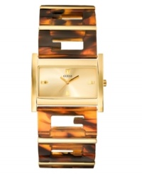 Chic tortoise logo links make up the bracelet of this iconic cuff bracelet watch by GUESS. Chic tortoise logo links make up the bracelet of this iconic cuff bracelet watch by GUESS.