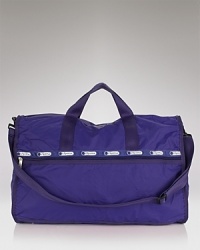 Get out of town! Durable ripstop nylon weekender with double handles and a longer adjustable shoulder strap. Get out of town! Durable ripstop nylon weekender with double handles and a longer adjustable shoulder strap.
