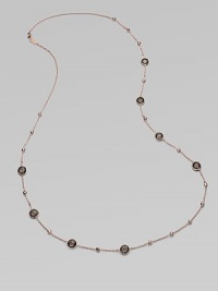 This 18k gold and sterling silver design is plated in 18k rose gold with faceted smokey quartz stations for a simply luxurious look. 18k gold and sterling silver with 18k rose goldplatingSmokey quartzLength, about 37Lobster clasp closureImported This 18k gold and sterling silver design is plated in 18k rose gold with faceted smokey quartz stations for a simply luxurious look. 18k gold and sterling silver with 18k rose goldplatingSmokey quartzLength, about 37Lobster clasp closureImported