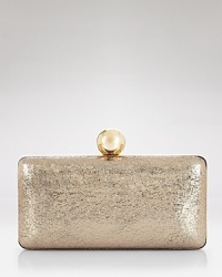 The day-to-evening clutch is the season's it-accessory, and this style from Milly works the trend with perfect, polished proportions and gleaming details. The day-to-evening clutch is the season's it-accessory, and this style from Milly works the trend with perfect, polished proportions and gleaming details.