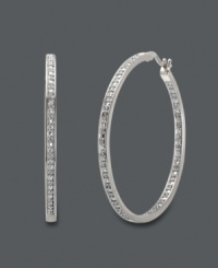 Stand out in a crowd. These large hoop earrings by Victoria Townsend are not for the shy. Crafted in sterling silver, these earrings shine with the addition of sparkling diamond accents. Approximate diameter: 1-4/8 inches. Stand out in a crowd. These large hoop earrings by Victoria Townsend are not for the shy. Crafted in sterling silver, these earrings shine with the addition of sparkling diamond accents. Approximate diameter: 1-4/8 inches.
