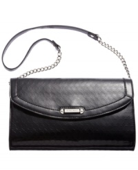 Be the fairest one of all with this glossy Mirror clutch from Nine West. Dressed in chic signature 9s and gleaming hardware, it's perfectly sized to stash all your out-on-the-town essentials. Be the fairest one of all with this glossy Mirror clutch from Nine West. Dressed in chic signature 9s and gleaming hardware, it's perfectly sized to stash all your out-on-the-town essentials.