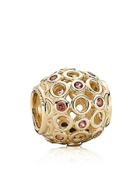 A Celtic-inspired charm in 14K gold with pink topaz bezel-set stone accents from PANDORA. A Celtic-inspired charm in 14K gold with pink topaz bezel-set stone accents from PANDORA.
