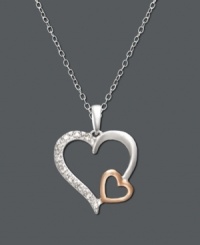 Double up on the love. Necklace features two open-cut hearts - one in sterling silver and an overlapping heart in 18k rose gold over sterling silver. Surface features a light dusting of round-cut diamond accents. Approximate length: 18 inches. Approximate drop: 1 inch. Double up on the love. Necklace features two open-cut hearts - one in sterling silver and an overlapping heart in 18k rose gold over sterling silver. Surface features a light dusting of round-cut diamond accents. Approximate length: 18 inches. Approximate drop: 1 inch.