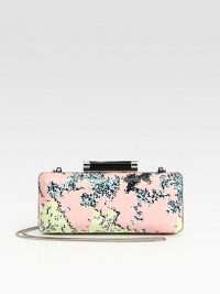 An abstract print accented with sparkling sequins throughout.Concealable chain shoulder strap, 21 dropTop clasp closureOne inside open pocketFully lined8W X 3½H X 1½DImported An abstract print accented with sparkling sequins throughout.Concealable chain shoulder strap, 21 dropTop clasp closureOne inside open pocketFully lined8W X 3½H X 1½DImported