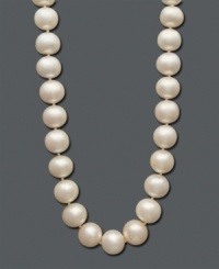 Nothing exudes elegance more than a classic pearl necklace. With a 14k gold clasp, Belle de Mer's sophisticated strand features cultured freshwater pearls (12-13 mm). Approximate length: 18 inches. Nothing exudes elegance more than a classic pearl necklace. With a 14k gold clasp, Belle de Mer's sophisticated strand features cultured freshwater pearls (12-13 mm). Approximate length: 18 inches.