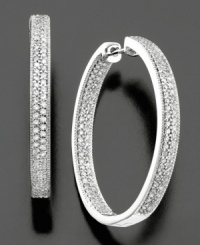 Glamorous hoop earrings complete with sparkling round-cut diamond (1 ct. t.w.) set in 14k gold. Approximate diameter: 1 inch. Glamorous hoop earrings complete with sparkling round-cut diamond (1 ct. t.w.) set in 14k gold. Approximate diameter: 1 inch.