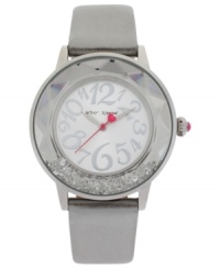 Glistening crystals swim in a faceted bezel on this elegant watch from Betsey Johnson. Glistening crystals swim in a faceted bezel on this elegant watch from Betsey Johnson.