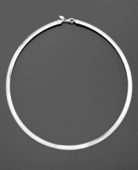 The perfect necklace for gifting or traveling, this beautiful and versatile Omega necklace displays 14k yellow gold on one side and sterling silver on the other. Approximate length: 17 inches. The perfect necklace for gifting or traveling, this beautiful and versatile Omega necklace displays 14k yellow gold on one side and sterling silver on the other. Approximate length: 17 inches.