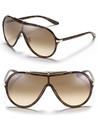 Retro-inspired shield sunglasses with a sweat bar and subtle metal accents for a casual and cool look.