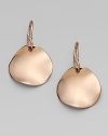 Simple, undulating discs, evoking the delicate wavy shape of a rose petal, in sterling silver and 18k gold, finished in polished 18k rose goldplating.18k gold and sterling silver with 18k rose goldplatingDrop, about 1Ear wireImported