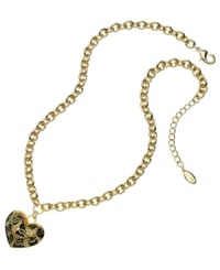 Be the predator, not the prey. GUESS's animal-inspired heart pendant features a fun, leopard print in black and brown epoxy and light Colorado topaz stones. Set in gold tone mixed metal. Approximate length: 16 inches + 2-inch extender. Approximate drop: 1 inch. Be the predator, not the prey. GUESS's animal-inspired heart pendant features a fun, leopard print in black and brown epoxy and light Colorado topaz stones. Set in gold tone mixed metal. Approximate length: 16 inches + 2-inch extender. Approximate drop: 1 inch.