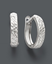 Traditional hoops take on a whole new texture. A diamond-cut surface creates faceted shine on these hinged, 14k white gold hoops. Approximate diameter: 1 inch. Traditional hoops take on a whole new texture. A diamond-cut surface creates faceted shine on these hinged, 14k white gold hoops. Approximate diameter: 1 inch.