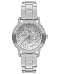 DKNY presents a serene timepiece with a shimmering dial. DKNY presents a serene timepiece with a shimmering dial.