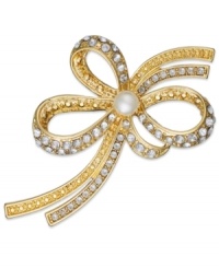 A lovely finishing touch. This golden bow pin from Charter Club sparkles with stone accents. Crafted in gold tone mixed metal. Approximate length: 2-1/2 inches. A lovely finishing touch. This golden bow pin from Charter Club sparkles with stone accents. Crafted in gold tone mixed metal. Approximate length: 2-1/2 inches.