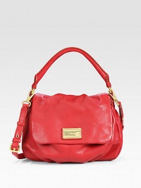 Supple pebbled leather bag with dual straps that can be worn across the body or along the shoulder for a truly versatile style. Top handle, 4½ dropAdjustable detachable shoulder strap, 15½-19¼ dropMagnetic flap closureTwo inside pocketsOne inside zip pocketFully lined13W X 11H X 4½DImportedPlease note: Hardware color varies by bag. Supple pebbled leather bag with dual straps that can be worn across the body or along the shoulder for a truly versatile style. Top handle, 4½ dropAdjustable detachable shoulder strap, 15½-19¼ dropMagnetic flap closureTwo inside pocketsOne inside zip pocketFully lined13W X 11H X 4½DImportedPlease note: Hardware color varies by bag.