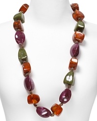 Add a splash of color to your look with this bold, beaded necklace from Pono. Add a splash of color to your look with this bold, beaded necklace from Pono.