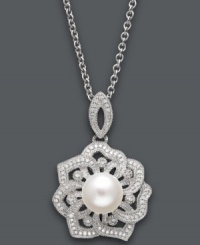 Natural inspiration. This stunning open-cut flower pendant features a single cultured freshwater pearl (8-9 mm) surrounded by round-cut diamond encrusted petals (1/5 ct. t.w.). Setting and chain crafted in sterling silver. Approximate length: 18 inches. Approximate drop: 1-1/4 inches. Natural inspiration. This stunning open-cut flower pendant features a single cultured freshwater pearl (8-9 mm) surrounded by round-cut diamond encrusted petals (1/5 ct. t.w.). Setting and chain crafted in sterling silver. Approximate length: 18 inches. Approximate drop: 1-1/4 inches.