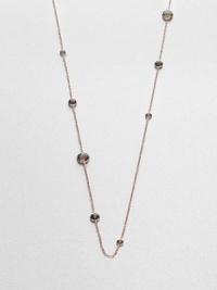 From the Rock Candy Collection. Small, medium and large lollipops of smokey quartz are stationed along a graceful chain in this long-enough-to-double strand of sterling silver and 18k gold, finished in 18k rose goldplating.Smokey quartz18k gold and sterling silver with 18k rose goldplatingLength, about 37Lobster claspImported From the Rock Candy Collection. Small, medium and large lollipops of smokey quartz are stationed along a graceful chain in this long-enough-to-double strand of sterling silver and 18k gold, finished in 18k rose goldplating.Smokey quartz18k gold and sterling silver with 18k rose goldplatingLength, about 37Lobster claspImported