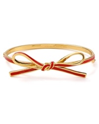 Take a bow. This delicate gold-plated bangle wraps the wrist in kate spade new york style. Take a bow. This delicate gold-plated bangle wraps the wrist in kate spade new york style.