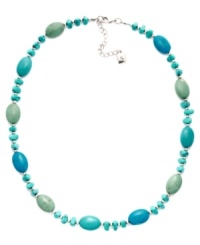Stylishly Southwestern. Reconstituted turquoise beads adorn this eye-catching necklace from Lauren Ralph Lauren. Whether you wear it to work or with more casual daytime outfits, it's sure to stand out as a chic complement. Crafted in mixed metal. Approximate length: 18 inches + 2-inch extender. Stylishly Southwestern. Reconstituted turquoise beads adorn this eye-catching necklace from Lauren Ralph Lauren. Whether you wear it to work or with more casual daytime outfits, it's sure to stand out as a chic complement. Crafted in mixed metal. Approximate length: 18 inches + 2-inch extender.