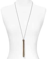 Channel the metallic trend with this tassel necklace from T Tahari. Embellished with gold, silver and hematite links, this attention grabbing style is a surprisingly versatile jewel box addition. Channel the metallic trend with this tassel necklace from T Tahari. Embellished with gold, silver and hematite links, this attention grabbing style is a surprisingly versatile jewel box addition.