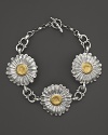 Blooming daisies make a feminine statement on Buccellati's chain bracelet.