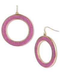 Girly sparkle is always a must. Betsey Johnson's fierce hoop earrings feature a dusting of fuchsia glitter for a flirty look. Set in gold tone mixed metal. Approximate drop: 2-1/2 inches. Approximate diameter: 2 inches. Girly sparkle is always a must. Betsey Johnson's fierce hoop earrings feature a dusting of fuchsia glitter for a flirty look. Set in gold tone mixed metal. Approximate drop: 2-1/2 inches. Approximate diameter: 2 inches.