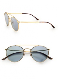 Small-frame metal sunglasses take a fresh approach to a cool vintage look. Available in gold frames with blue lenses.Metal100% UV ProtectionImported